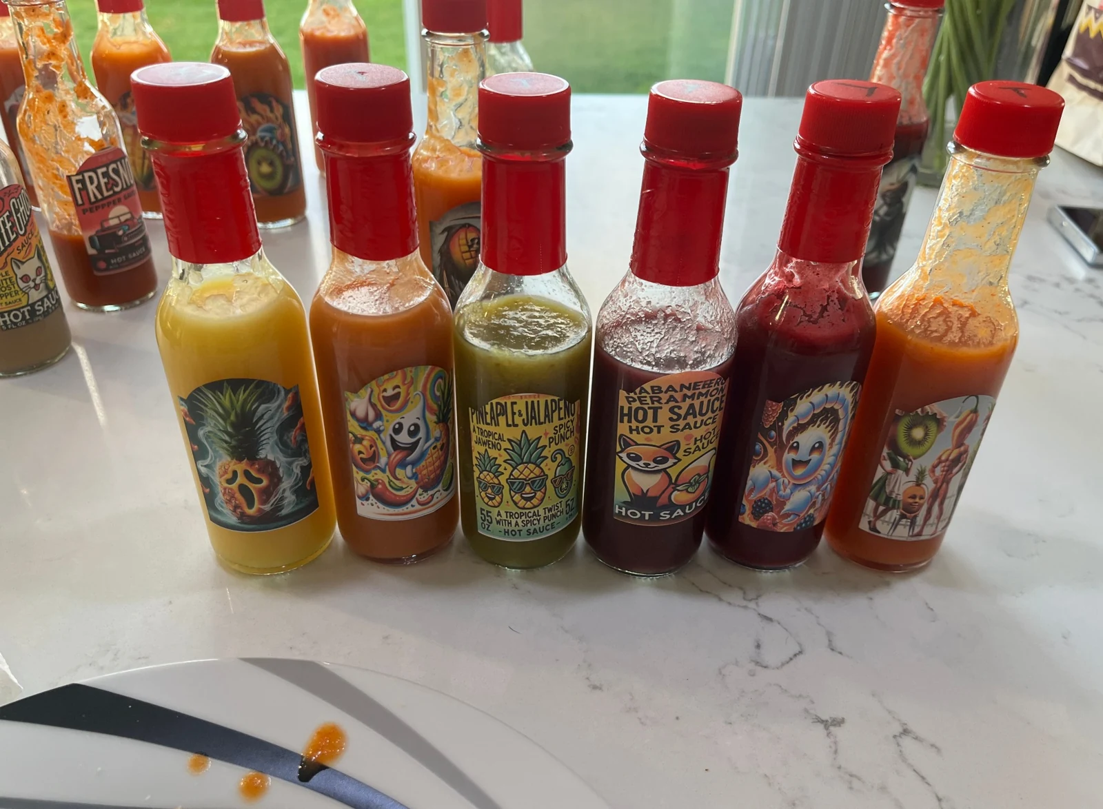 Homemade hot sauce bottles with a lineup of fun custom labels